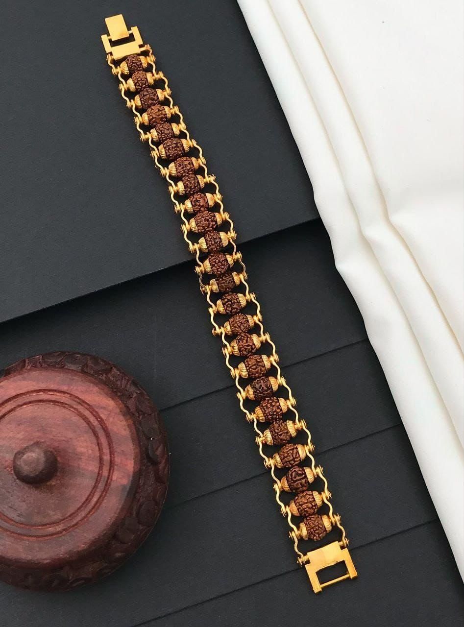 Genuine Paanch Mukhi Rudraksha Bracelet With Gold Plating.