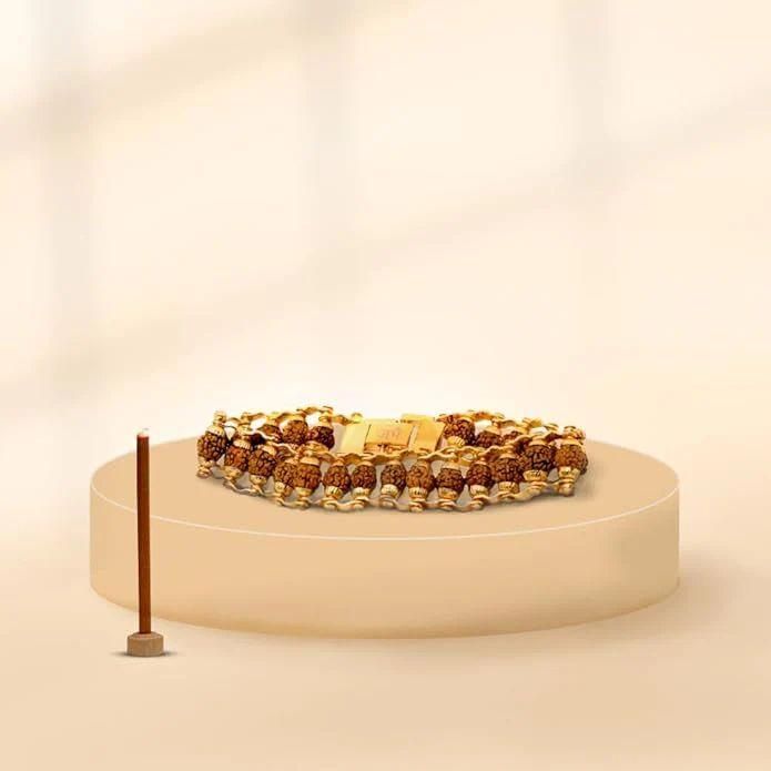 Genuine Paanch Mukhi Rudraksha Bracelet With Gold Plating.