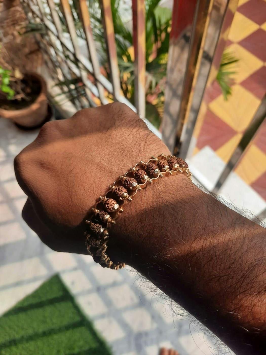 Genuine Paanch Mukhi Rudraksha Bracelet With Gold Plating.